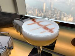 03B Enjoying a delicious tasty cocktail at The Ozone rooftop bar Ritz-Carlton overlooking Kowloon and Hong Kong